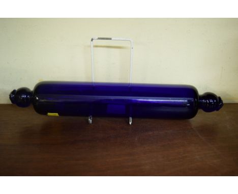 A Bristol Blue glass rolling pin, by Thomas Webb, with moulded ends, 36cm long.