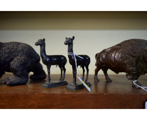 A pair of bronze figures of llamas, 12.5cm high. 