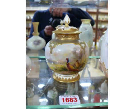 A Royal Worcester pot-pourri vase and pierced cover, circa 1932, the quatrelobe body painted with a pair of pheasants in a la