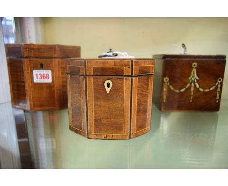 A George III mahogany, line inlaid and crossbanded octagonal tea caddy, 12cm wide, with original key. 