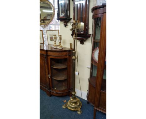 A good brass adjustable three light standard lamp.