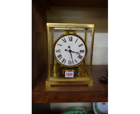 A Jaeger LeCoultre brass Atmos Clock, circa 1950s, No.97388, 22cm high. Condition Report: In working order, a service could b