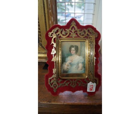 English School, early 19th century, a half-length portrait miniature of an elegant young lady, 11 x 8.5cm, in an elaborate br