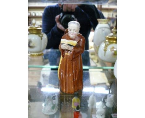 A Royal Worcester candle snuffer figure of 'Monk', 12.5cm high. 