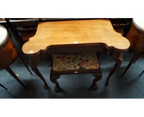 An 18th century mahogany card table, the foldover top with dished wells and outset corners, 90cm wide.  Condition Report: Ove