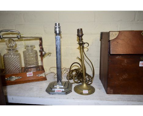 An Art Deco chrome table lamp, height excluding fitting 27cm; together with another Benson style brass example.