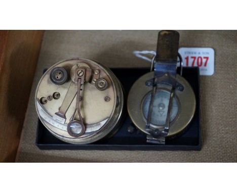 A reproduction brass gimbal compass; together with a brass prismatic instrument.