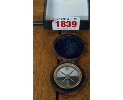 A Victorian Singer's Patent pocket compass in leather case. 