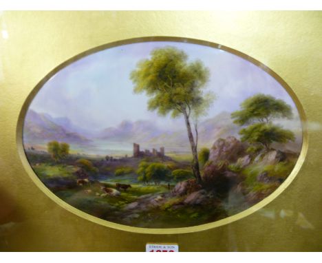 Attributed to Royal Worcester, an oval plaque, painted by Harry Davis, with a figure, cows and sheep in a landscape with ruin