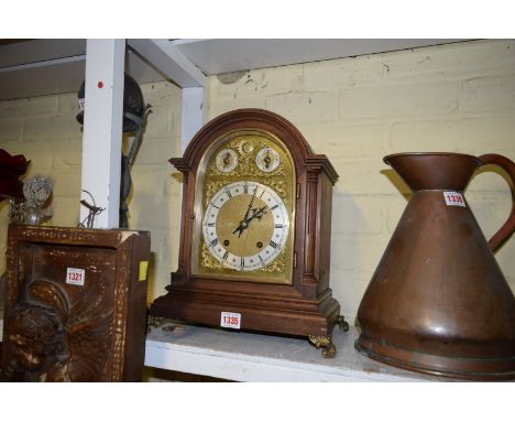 An 18th century style mahogany mantel clock, 36.5cm high. 