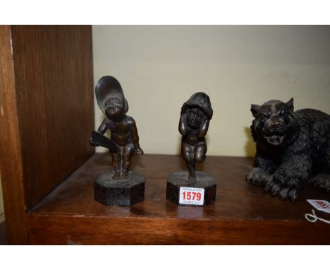 A pair of bronze figures of children, each on a chamfered square marble base, total height 16cm. 