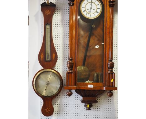 An Edwardian mahogany cased barometer and thermometer with inlaid shell decoration, 38" high 