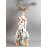 An Imari porcelain figure of a woman with replacement head, 20 1/2" high, two Chinese celadon glazed