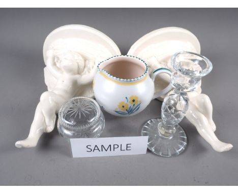 A pair of ceramic cherub wall brackets, a Poole Pottery jug, a cut glass dressing table set, etc 