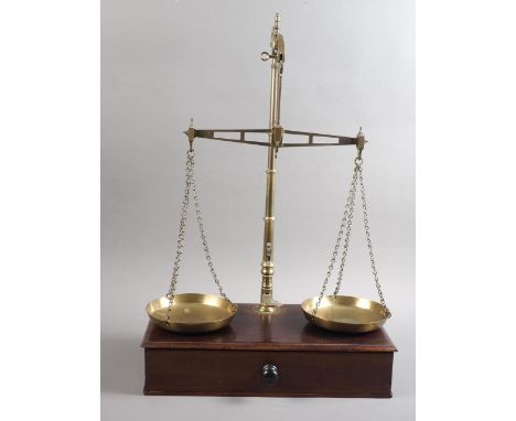 A 19th century W &amp; T Avery brass balance, on mahogany stand, fitted drawer, 15" wide, an early 20th century stick telepho