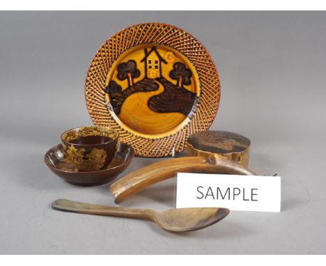 An antique Japanese lacquered shaped box with landscape decoration, 4" wide, a slipware dish with cottage decoration, 9" dia,