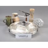 An Art Deco stainless steel and glass lazy Susan, a scale model refracting telescope, studio