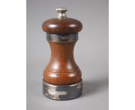 A mahogany and silver mounted "Peter Piper" pepper grinder, 4" high 