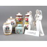 Three Porceval figures of women, faience style pottery jars and covers and other items