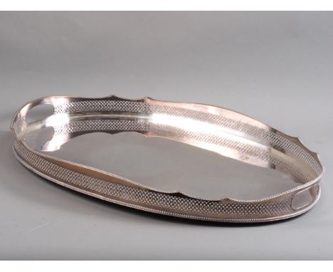 A silver plated on copper oval gallery tray, 24" max dia 