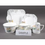 A Heathcote "Best Bone" china tulip pattern teaset for six (no teapot)