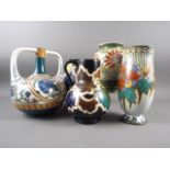 An early 20th century Gouda two-handled vase, a similar jug and three other Gouda vases, tallest 10"