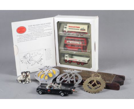 A Corgi Batmobile with figures, a set of three "Fisherman's Friend" die-cast models, in original box, a cribbage board, two A