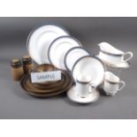 A Royal Albert "Sandringham" pattern part combination service, a Denby part combination service