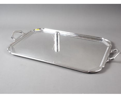 An Art Deco silver plated two-handled tea tray, by Roberts &amp; Belk, 22 1/2" wide, and a silver kitchen pepper, 0.9oz troy 