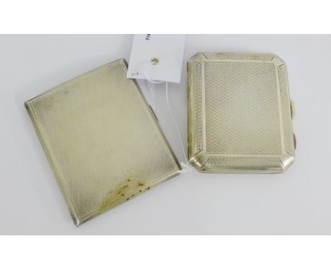 Two George V silver cigarette case, each with engine turned decoration, one hallmarked for Birmingham 1922 the other for Shef