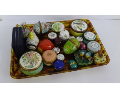 A collection of various enamel pill boxes to include Bilston and Battersea enamels by Halcyon Days, a ceramic hen-on-nest and