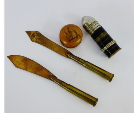 Trench Art, to include two paper knives and a lighter, together with a Mauchline style box and cover, (4) 