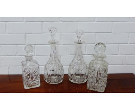 A collection of four glass decanter and stoppers, (4)