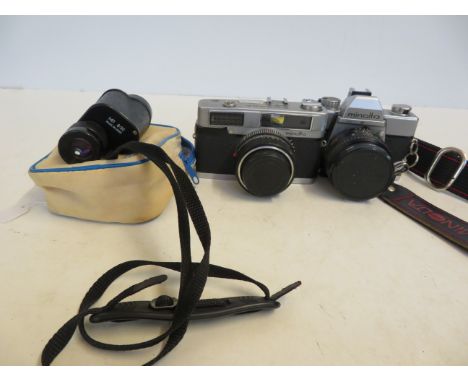 2x Minolta cameras together with a minocular