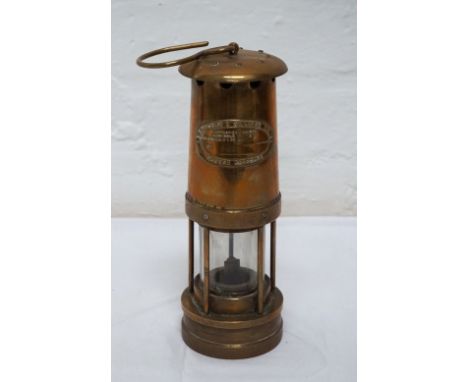 VINTAGE BRASS AND GLASS SAFETY LAMP
by 'E.Thomas & Williams Ltd., Aberdare', with hanging hook
