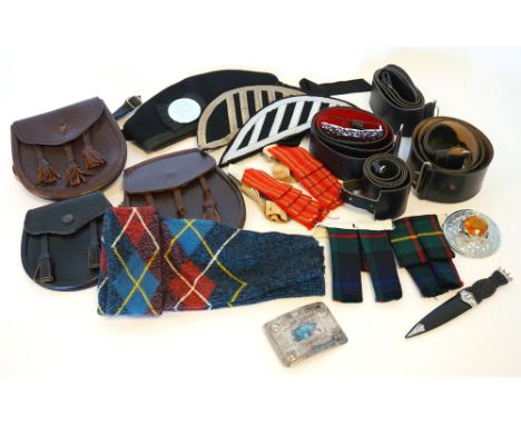 SELECTION OF HIGHLAND PIPERS ACCESSORIES
including two brown leather sporrans with tassels, a black leather sporran with tass