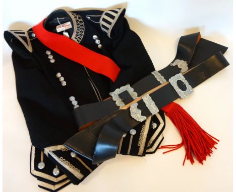 PIPE BANDSMAN'S TUNIC
with silver thread braiding and thistle decorated buttons, two leather cross belts and a red woven sash