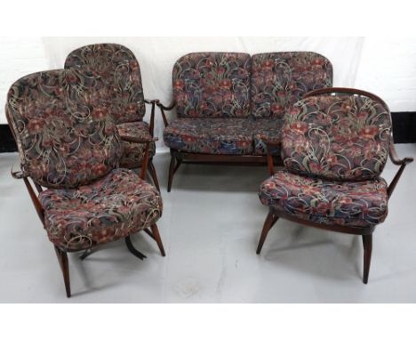 SUITE OF ERCOL FURNITURE
comprising a two seater sofa, a pair of armchairs and another armchair, all with stick backs and sta