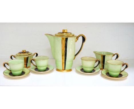 ART DECO CARLTON WARE COFFEE SET
in mint green with black and gilt detail, comprising seven cups, seven saucers, milk jug, su