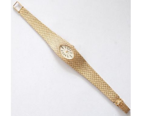 LADY'S OMEGA NINE CARAT GOLD WRISTWATCH
circa 1970, the oval dial with baton markers,  the 17 jewels 650 caliber movement mar