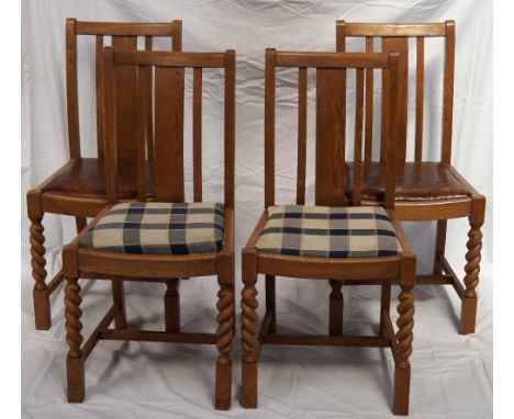 SET OF FOUR LIGHT OAK DINING CHAIRS
with drop in seats, standing on barley twist front supports united by a stretcher (4)
