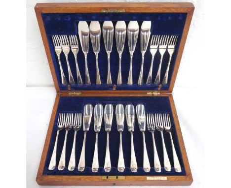 VINTAGE 'ELKINGTON & Co.,GLASGOW' OAK CASED CUTLERY CANTEEN
containing a set of plated fish knives and forks