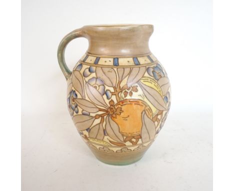 CHARLOTTE RHEAD BURSLEY WARE POTTERY JUG
decorated with flowers and fruit, 23.5cm high 