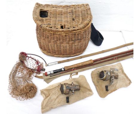 MILBRO THREE SECTION FLY ROD
of fibreglass construction with cork handle, 9' 3" with original cloth bag, together with a vint