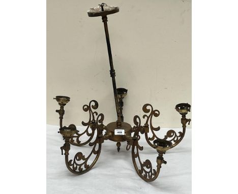 An early 20th Century gilt brass five light gasolier. 24" diam. Converted to electric light.