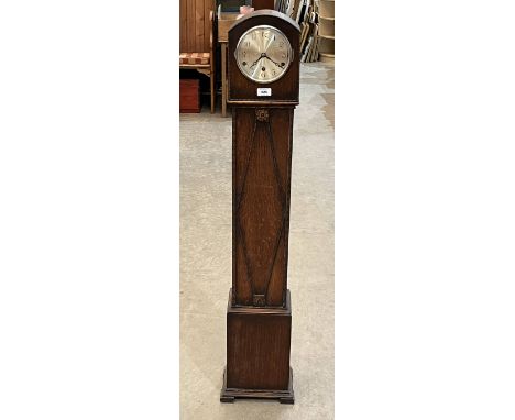 A 1930s small oak longcase clock, the German movement striking and chiming on five tubular gongs. 50" high.