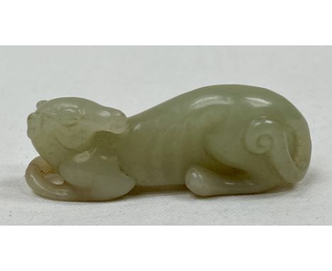 A Chinese jade antelope carving, 2¼" long.