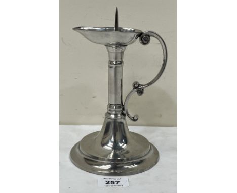 An early 20th Century Arts and Crafts pewter chamber pricket stick, by A.E. Williams. 8" high.