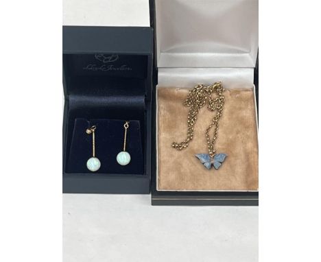 A 9ct opal butterfly pendant and a pair of 9ct opal pendant drop earrings.