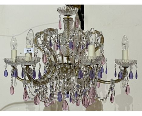 A Bohemian six light chandelier, hung with festoons of pendants and prismatic drops. 24" diam.